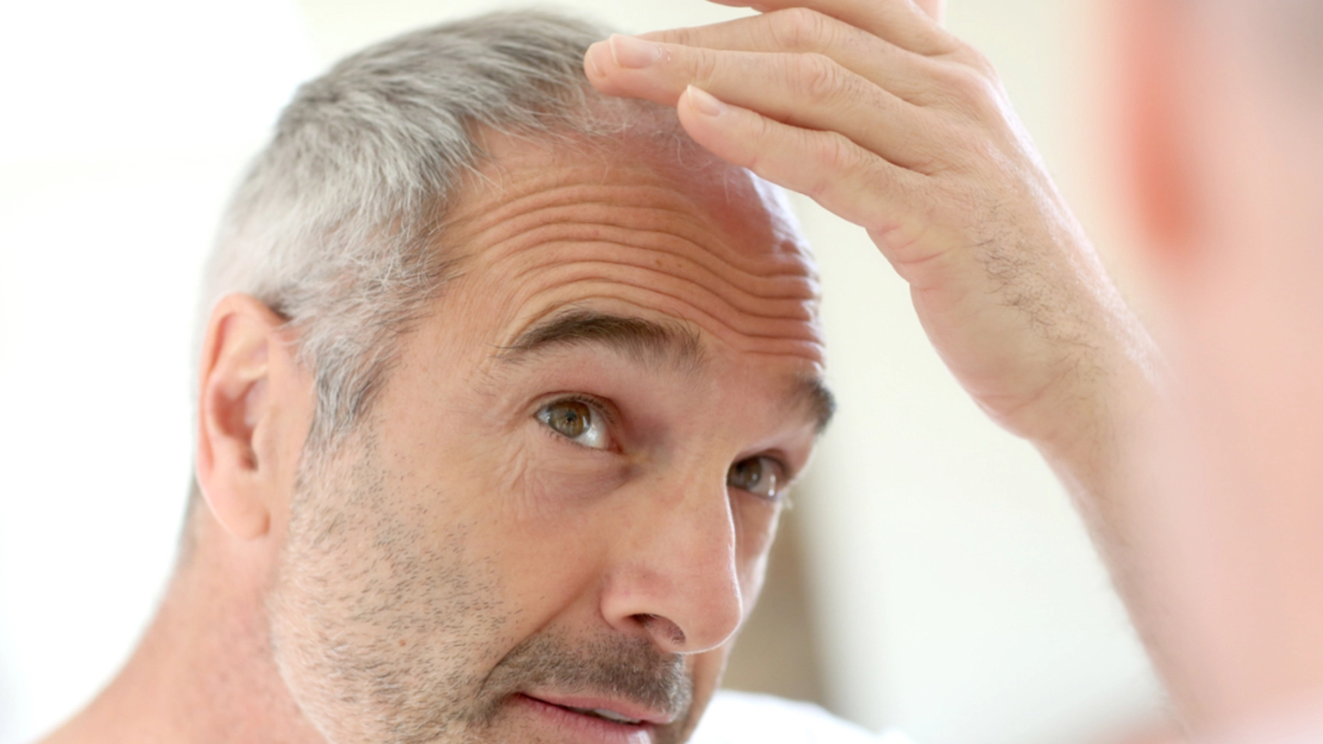 Vitenskapelig oppdagelse kan være nøkkelen til å forhindre grått hår