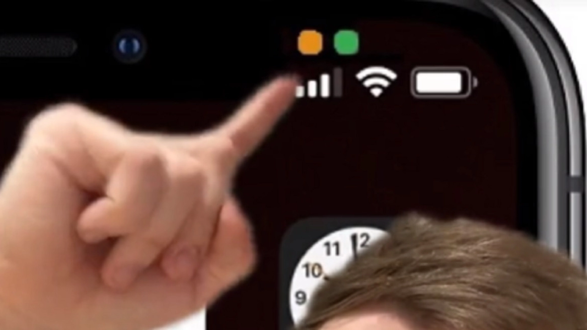 Advarer brukere om oransje prikk på iPhone