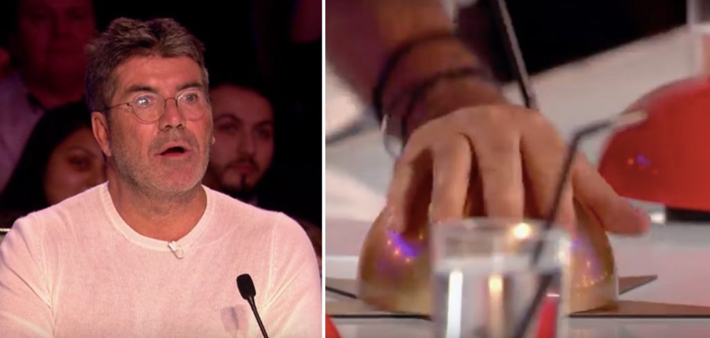 Simon Cowell sukker da deltaker avslører sitt umulige sangvalg – men minutter senere kaster han seg over knappen